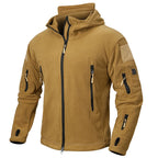 VALEWARD Watchman Hooded Fleece in Field Sand, showing the chest zip pocket