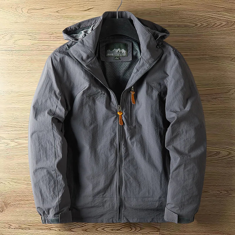 VALEWARD Waypoint Lightweight Shell in Gunmetal Grey, showing the chest zip pocket