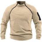 VALEWARD Sentry Tactical Fleece Pullover in Field Sand, front view showing the offset diagonal zip and stand collar.